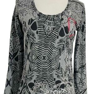 Desigual Size Large but feels more like a medium. Very fitted top
